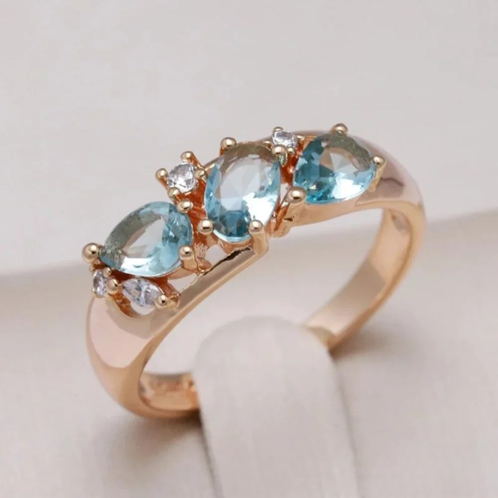 Anillo de oro con circonia azul