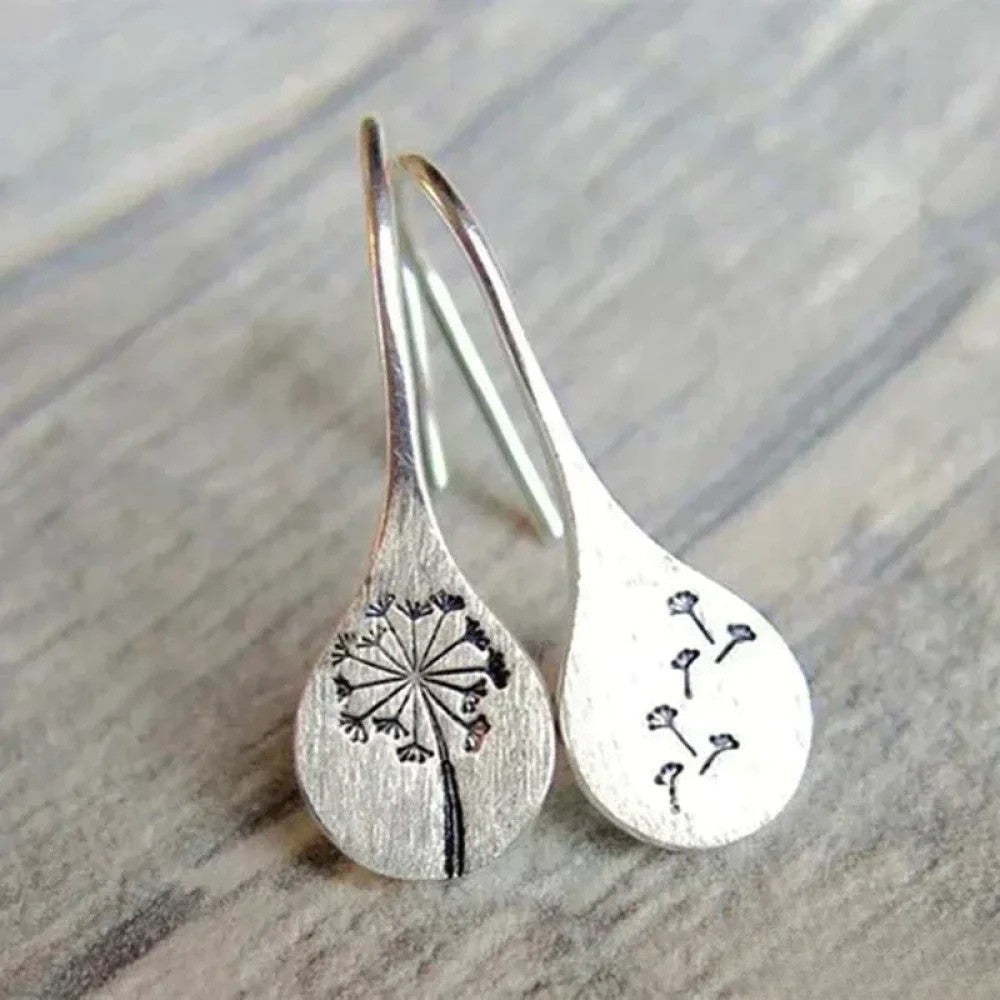 Pendientes elegantes de plata con diseño de hoja de diente de león
